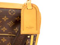 A Louis Vuitton Leather Garment Bag — 20TH CENTURY