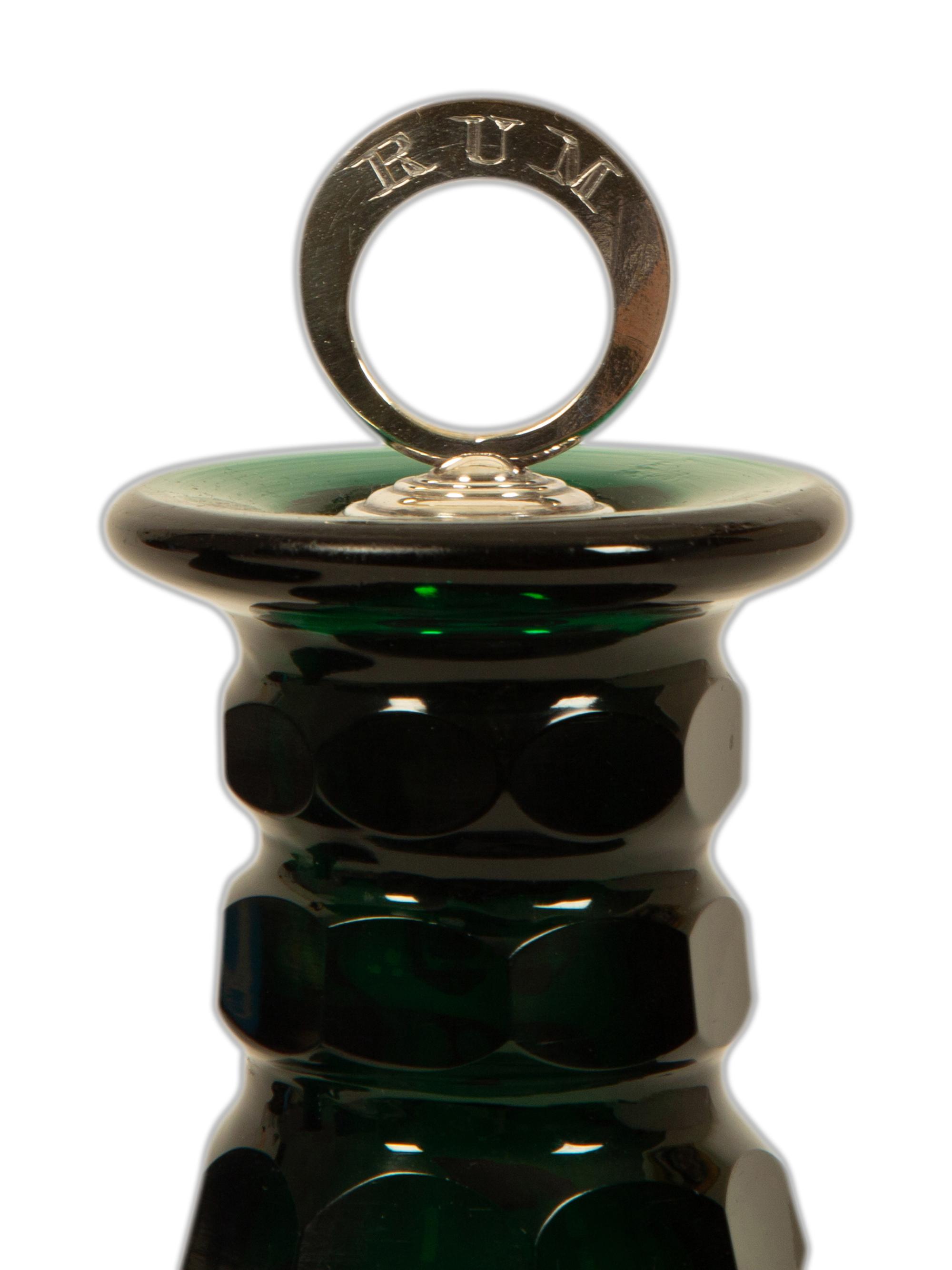 A Pair of Bristol Green Cut Glass Ship's Decanters with Silver Ring Stoppers