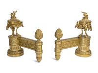 A Pair of Louis XVI Style Gilt Bronze Chenets with Flaming Urn Finials — 20TH CENTURY