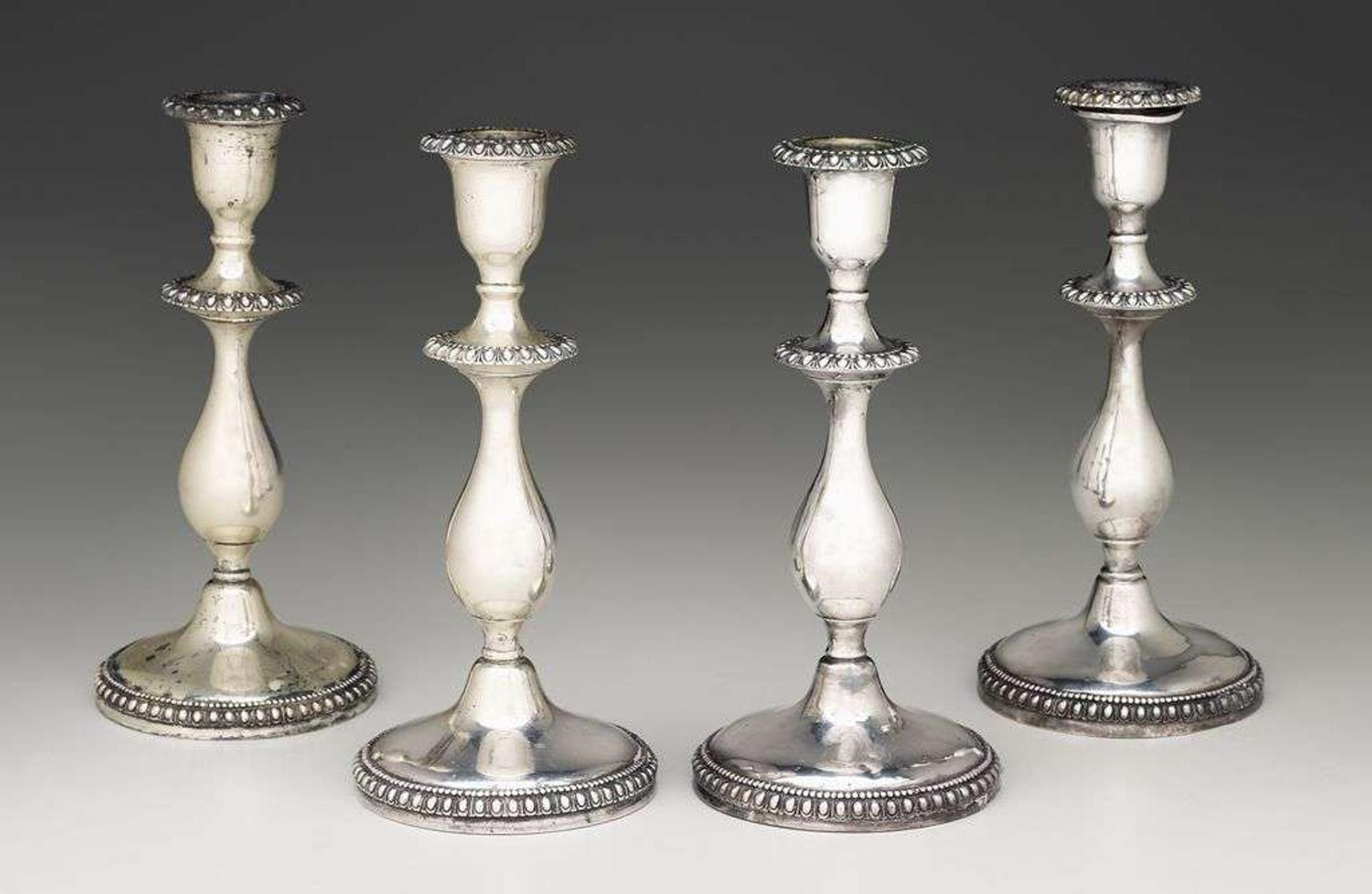 Four sterling silver candlesticks j.e. caldwell & co., philadelphia, pa, late 19th/early 20th century