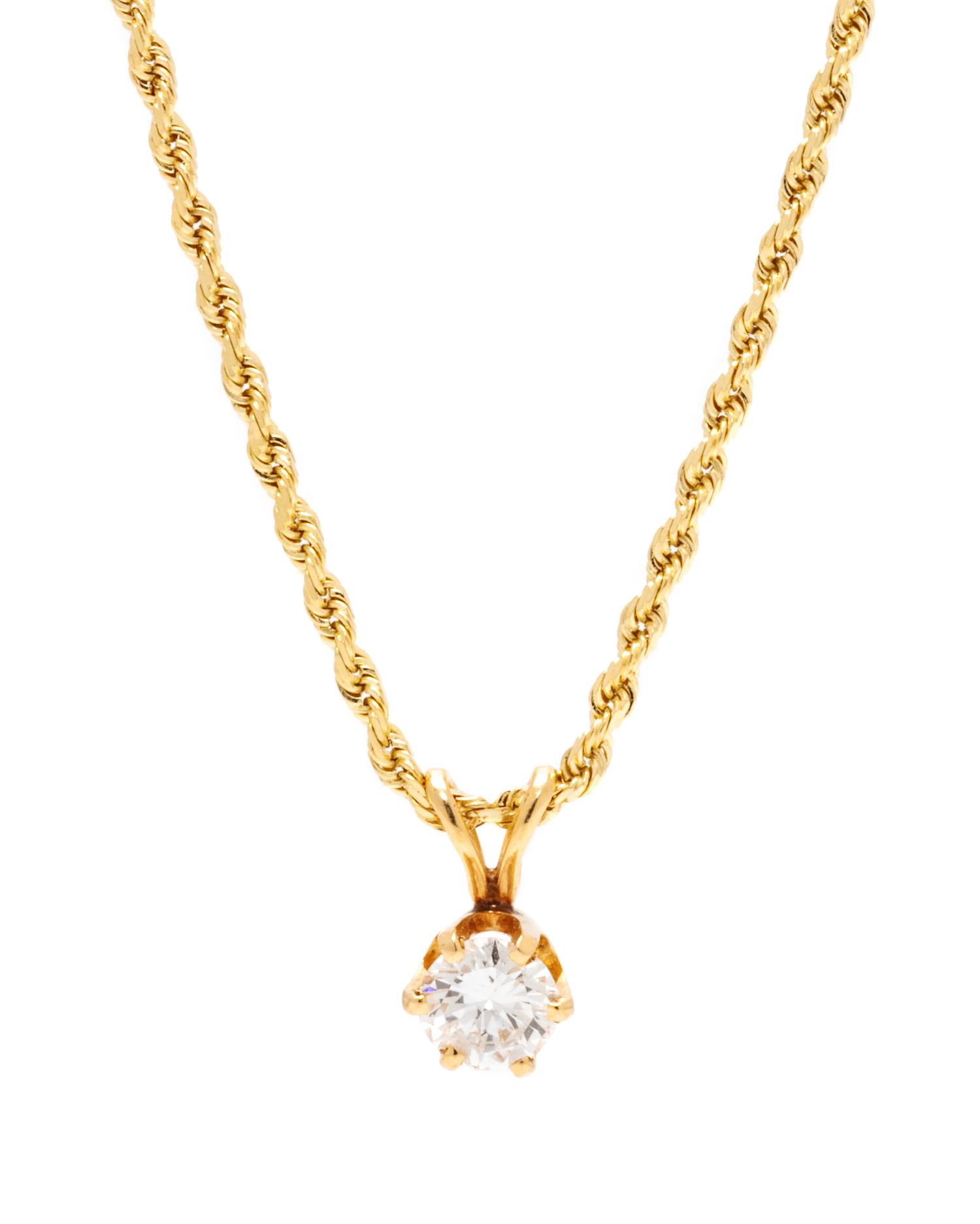 A 14 Karat Yellow Gold and Diamond Pendant/Necklace,