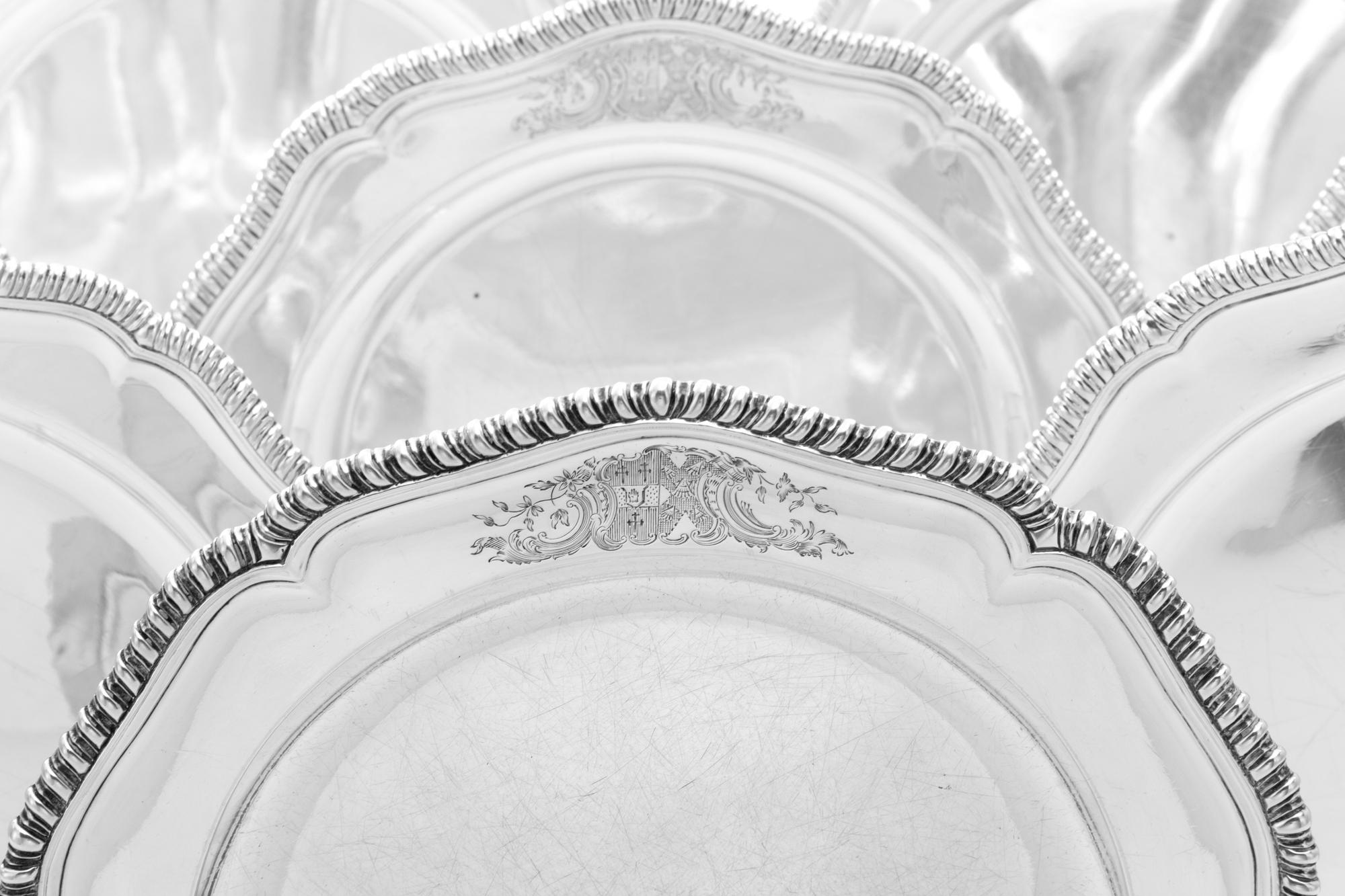 A Set of Twelve Irish George III Silver Dinner Plates, Robert Calderwood, Dublin, Circa 1762, each having an undulating gadrooned rim a