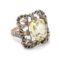 An 18 Karat Yellow Gold, Silver and Yellow Sapphire Ring,