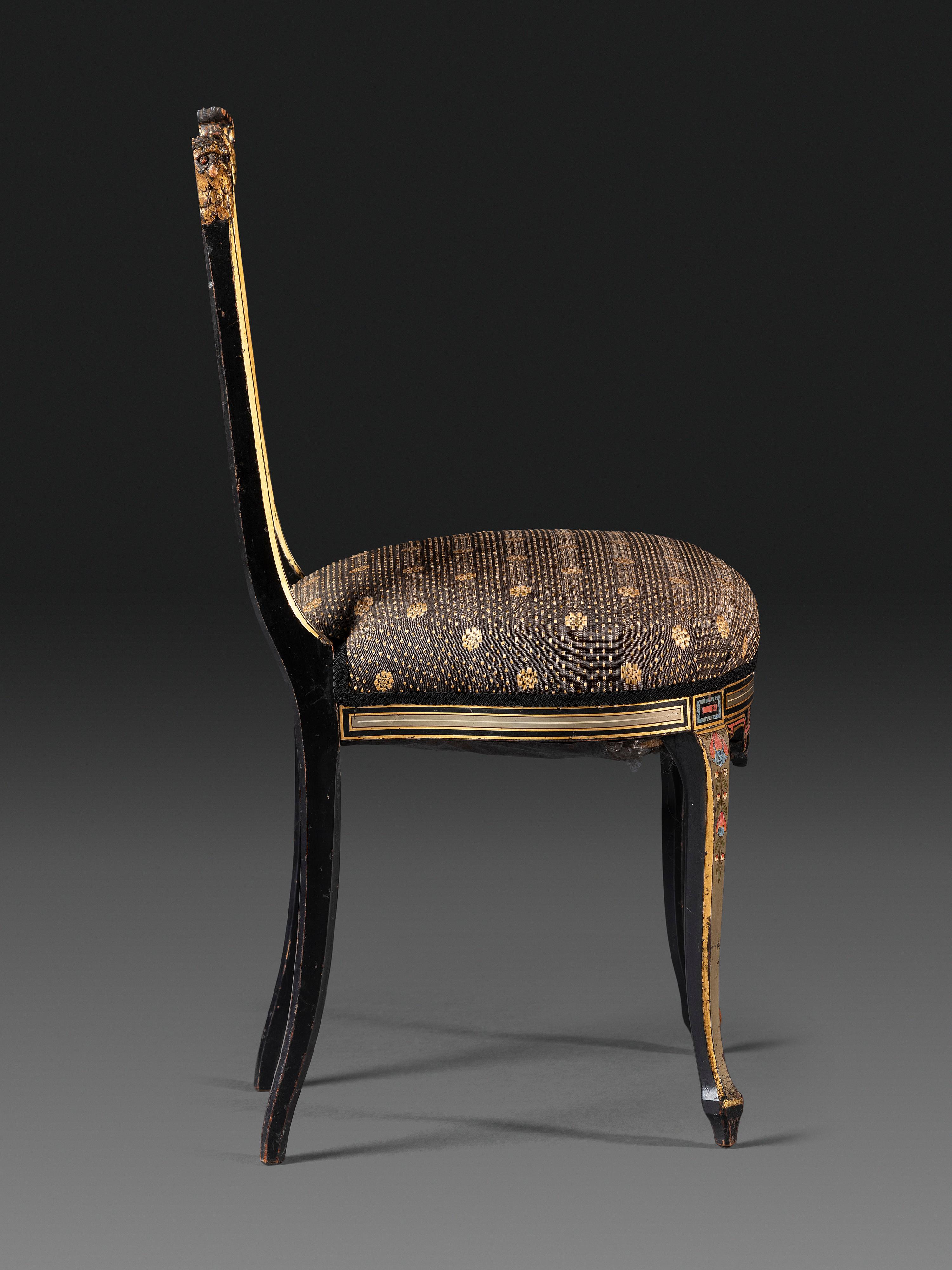 An Aesthetic Movement Painted, Parcel Gilt and Ebonized Bird-Carved Side Chair