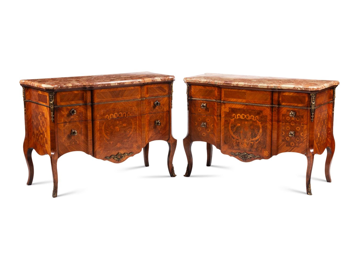 A Pair of Late Louis XV Style Gilt Bronze Mounted Marquetry Marble-Top Commodes