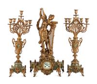 A French Metal and Onyx Clock Garniture with Figure after Francois Moreau (French, 1832-1927)