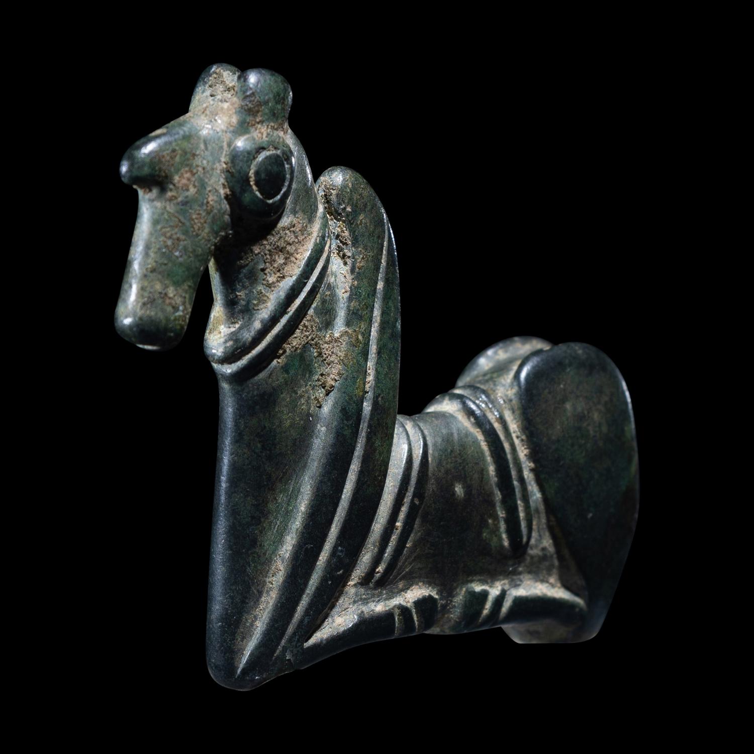 A Luristan Bronze Pin Finial- Provenance: Mathias Komor, New York, prior to 1955. Acquired by the present owner from the above, 17 December 1955.