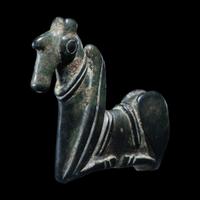 A Luristan Bronze Pin Finial- Provenance: Mathias Komor, New York, prior to 1955. Acquired by the present owner from the above, 17 December 1955.