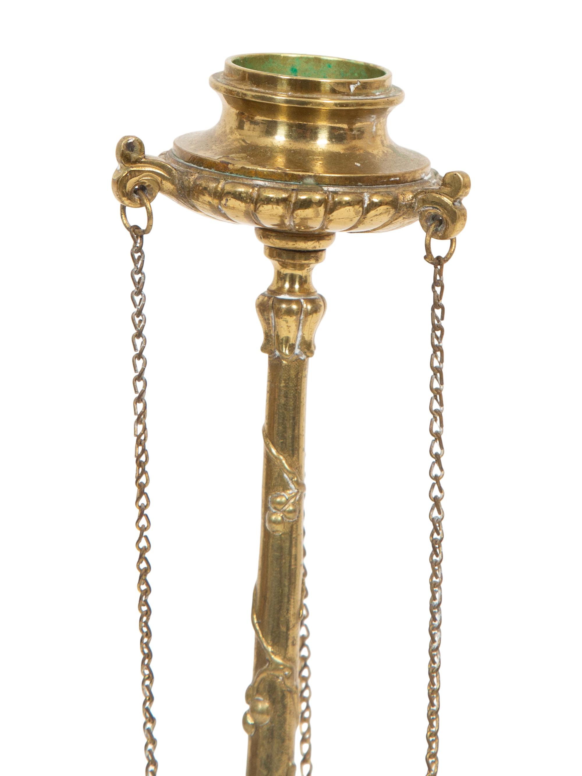 A Pair of English Brass Candlesticks