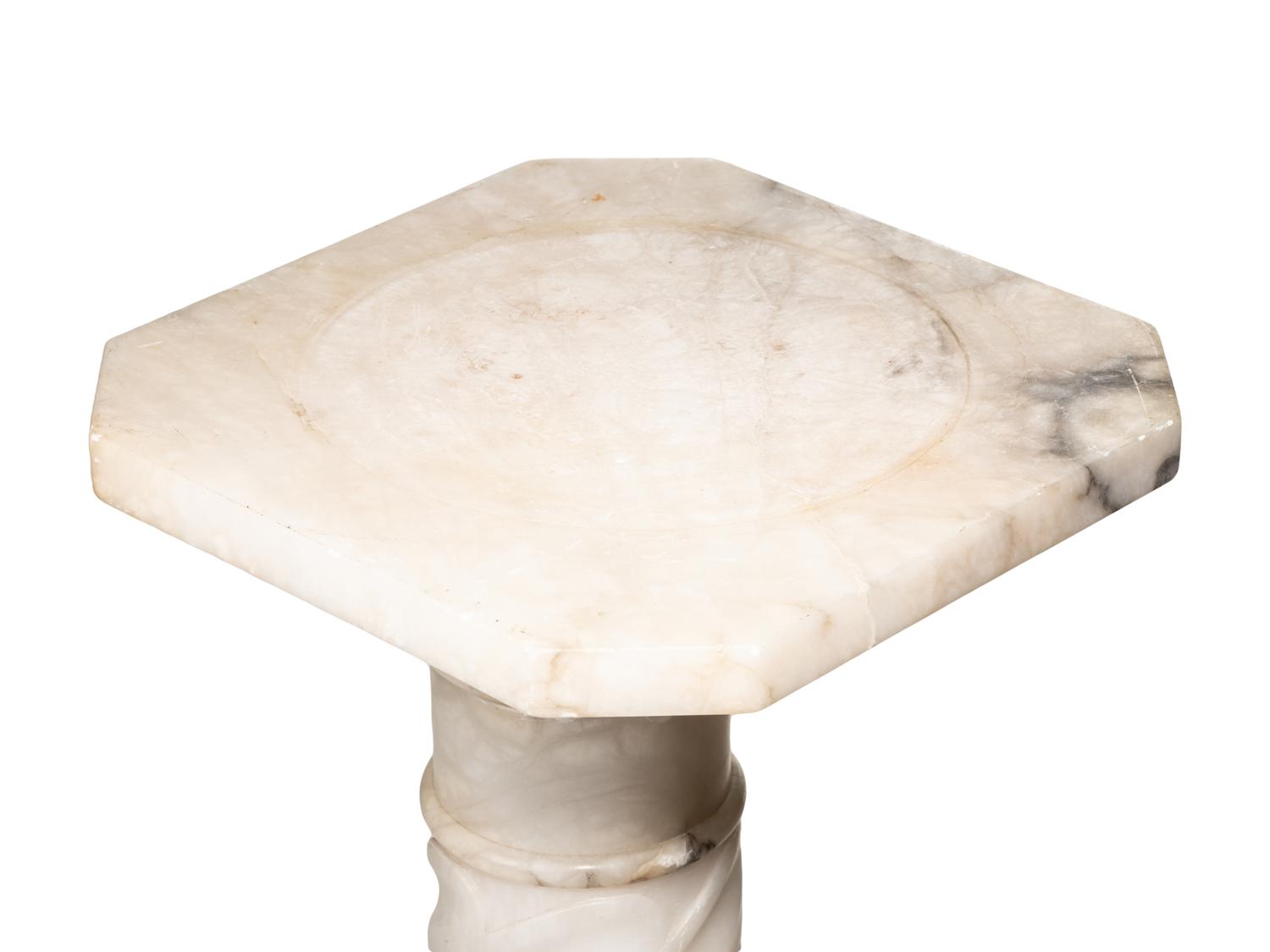 A Continental Carved Marble Pedestal