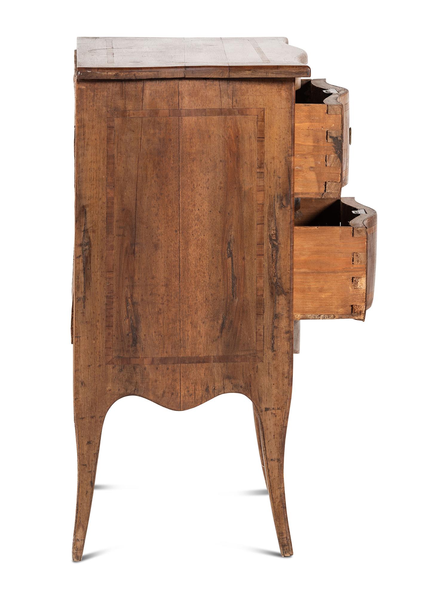 An Inlaid Walnut Commode