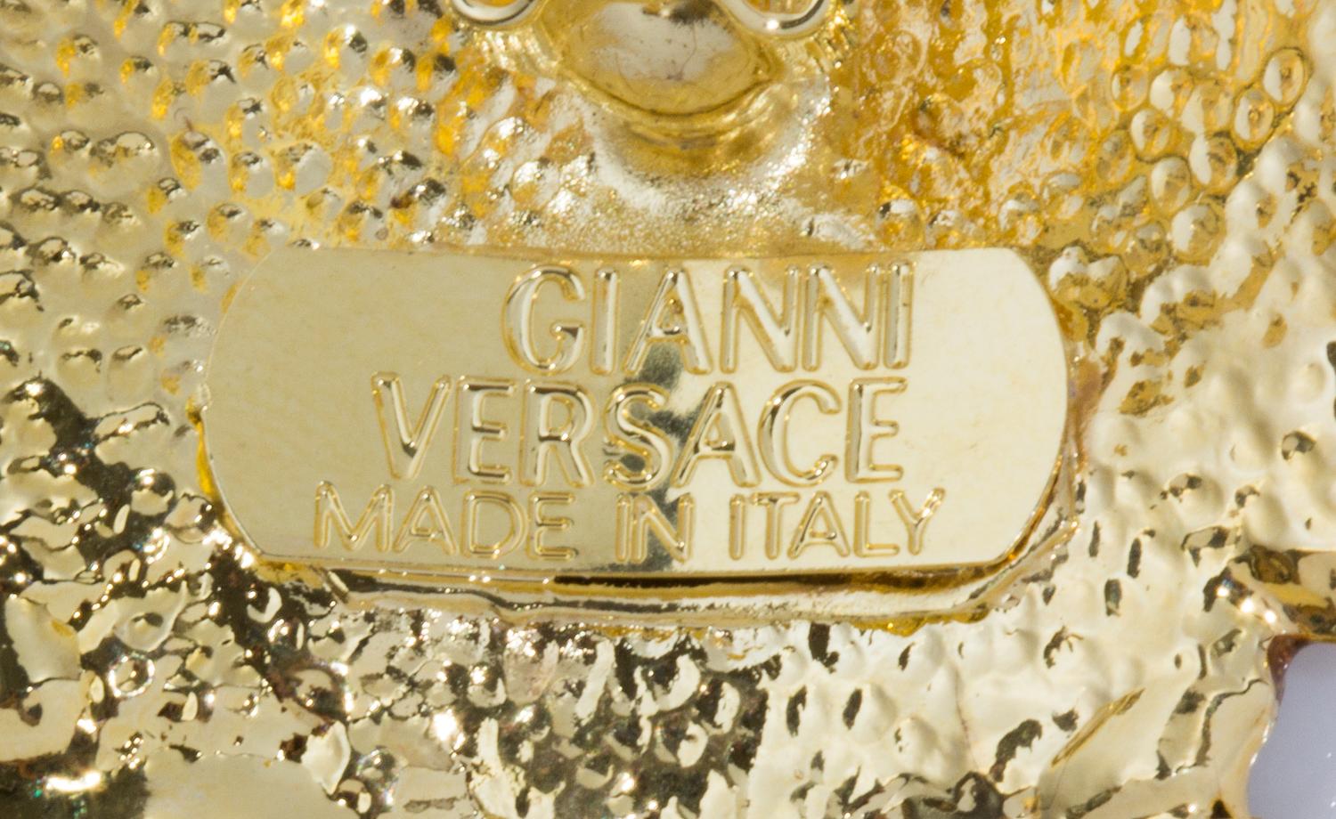 A Pair of Gianni Versace Medusa and Rhinestone Fringe Earclips, Medallion: 1.75" diameter; Drop: 3.5".