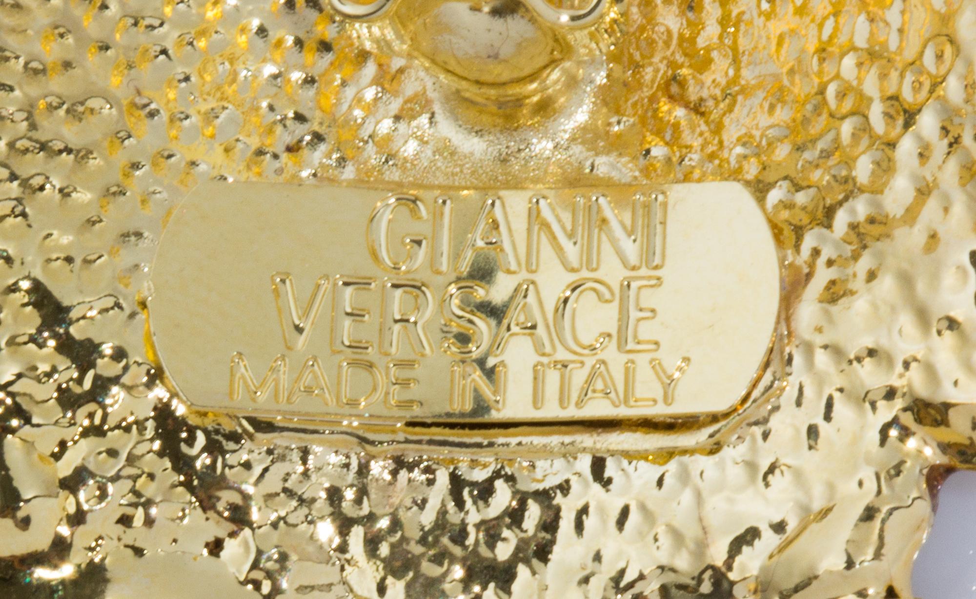 A Pair of Gianni Versace Medusa and Rhinestone Fringe Earclips, Medallion: 1.75" diameter; Drop: 3.5".