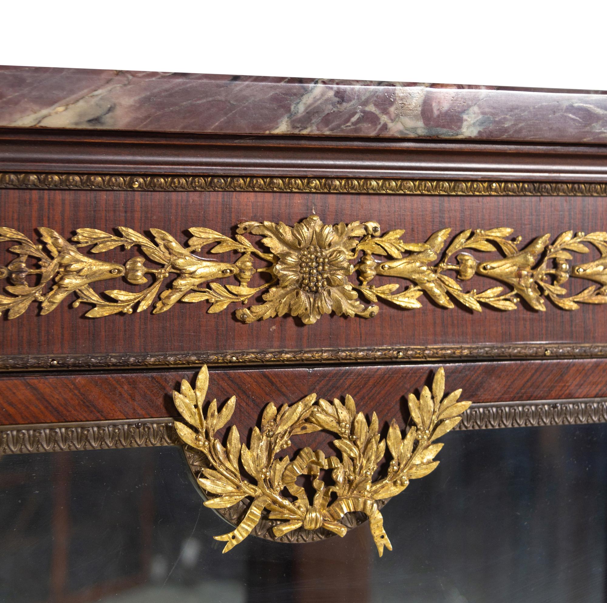 A Louis XVI Style Gilt Bronze Mounted Kingwood Veneered Marble-Top Vitrine Cabinet