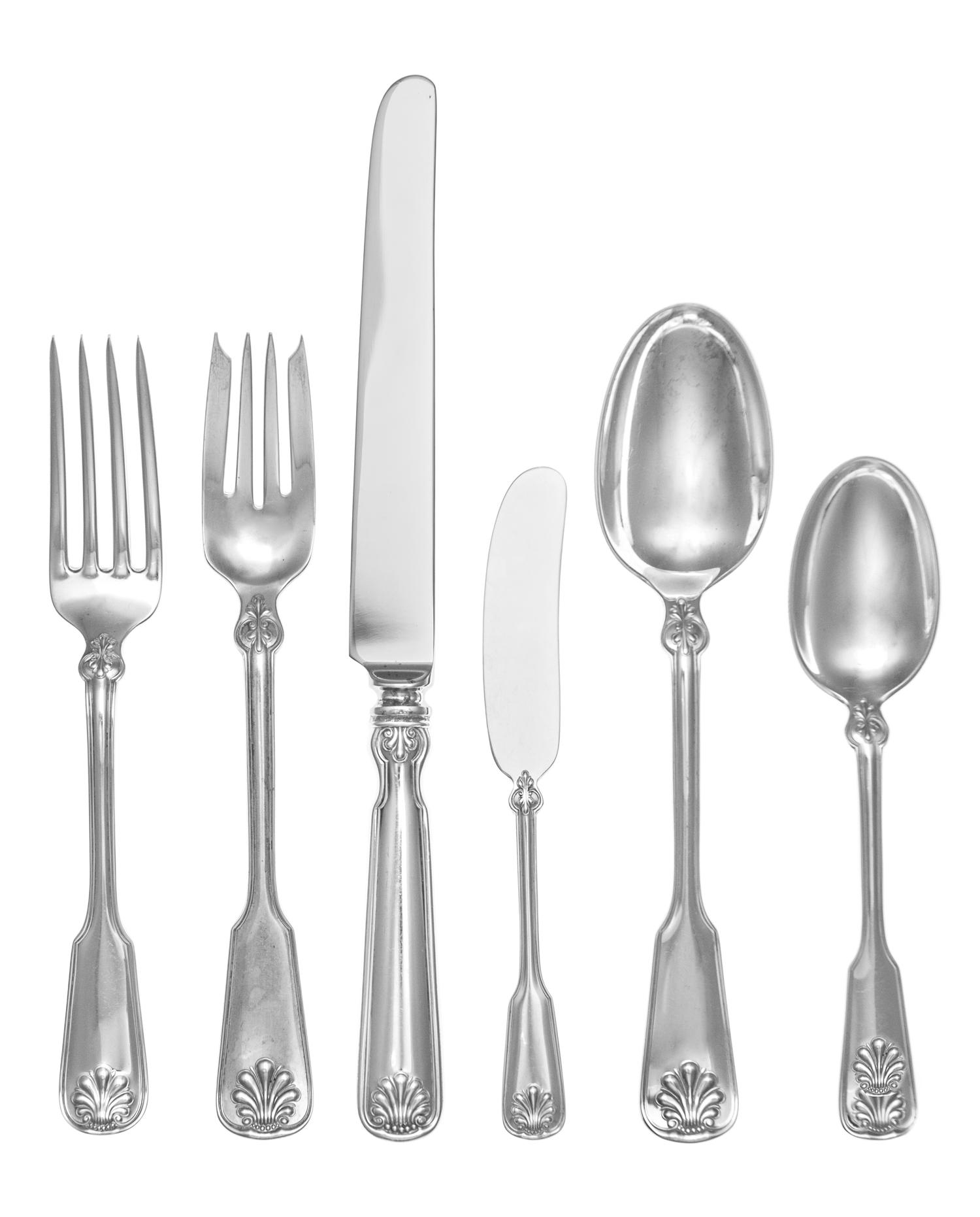 An American Silver Flatware Service, Tiffany & Co., New York, NY, Shell and Thread pattern, comprising: 8 luncheon knives 8 butter kniv