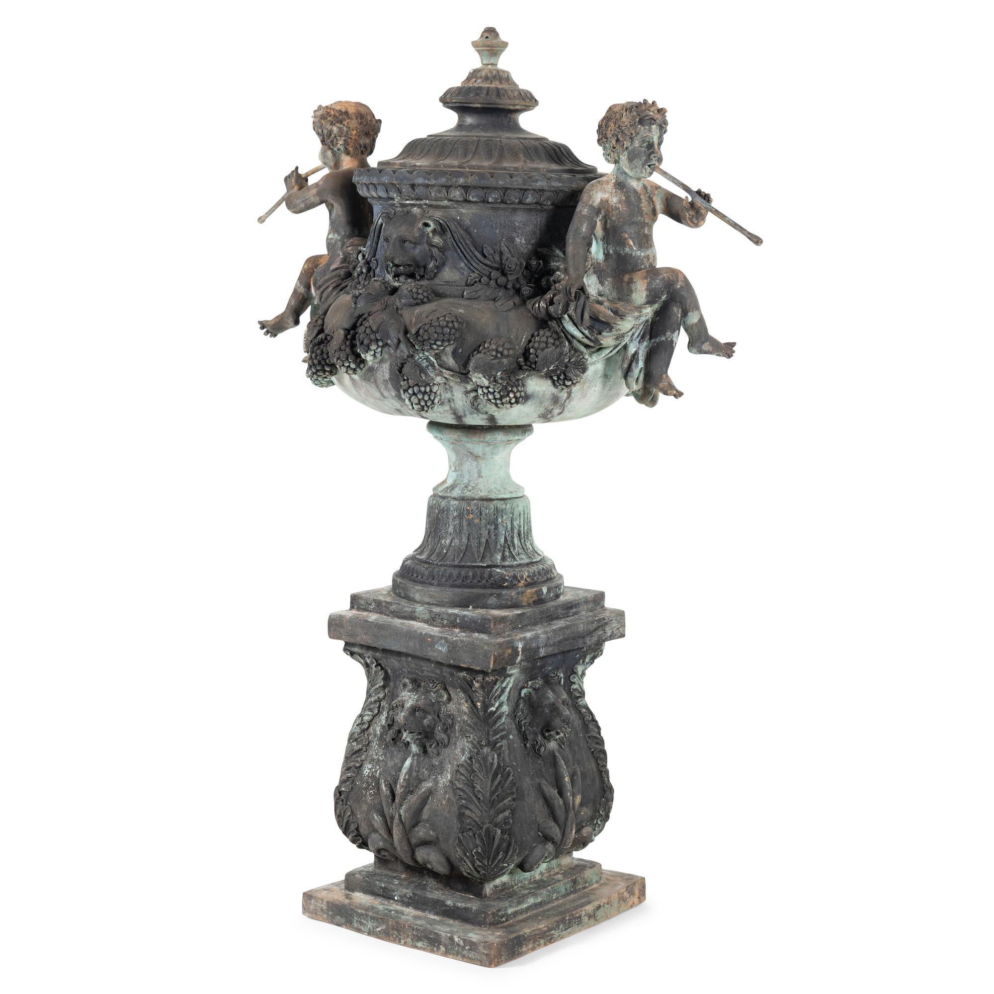A Patinated Bronze Fountain Urn on Plinth