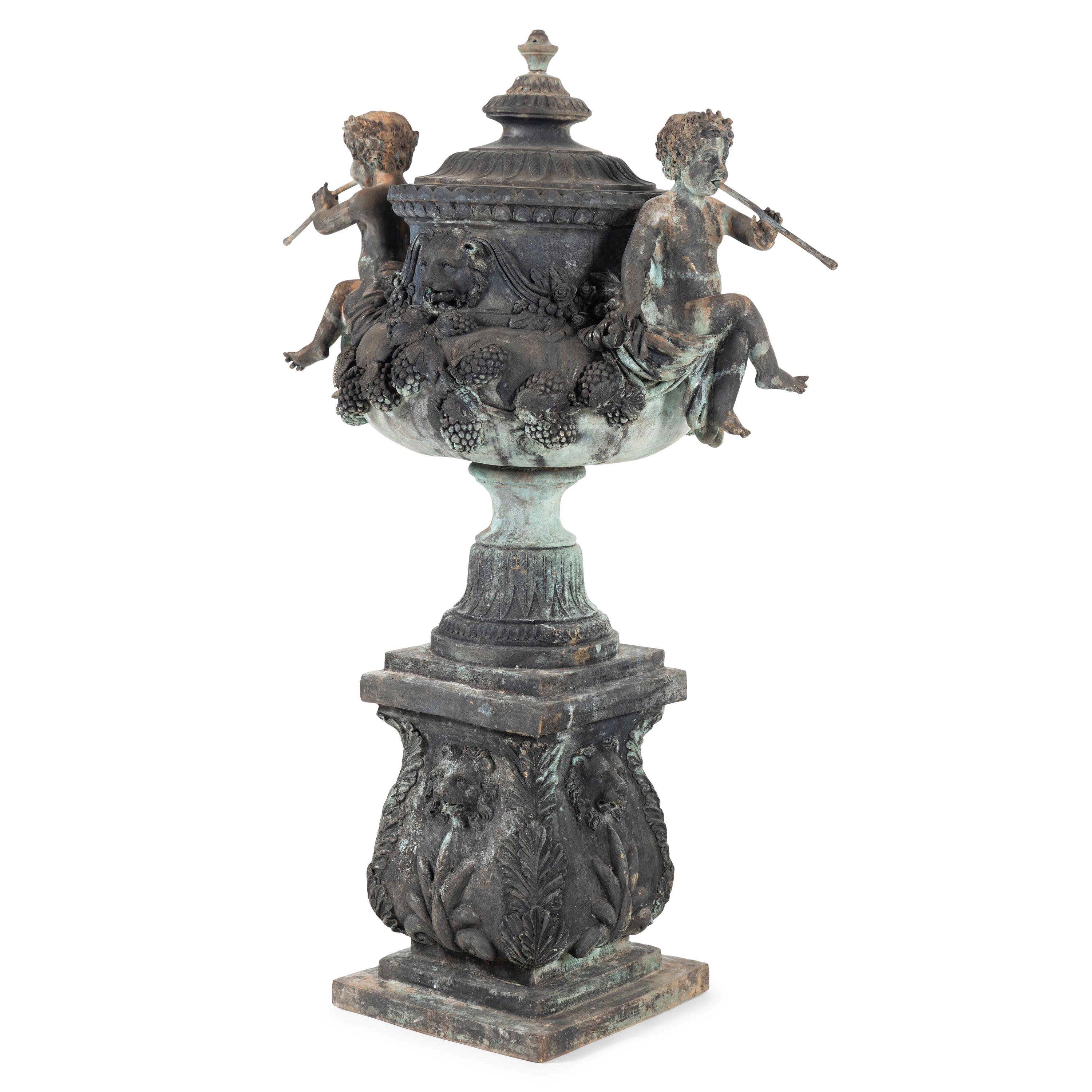 A Patinated Bronze Fountain Urn on Plinth