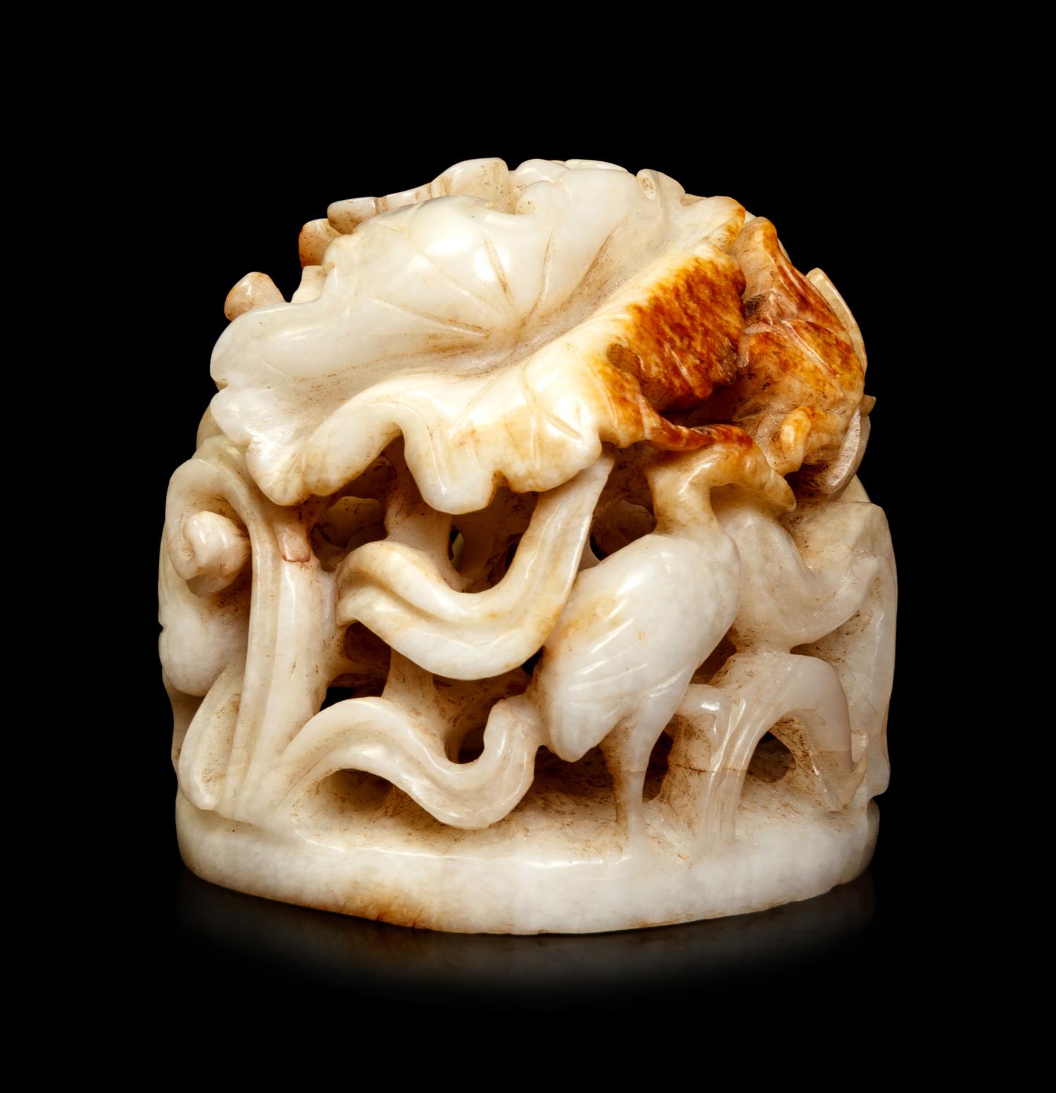 A White and Russet Jade Finial