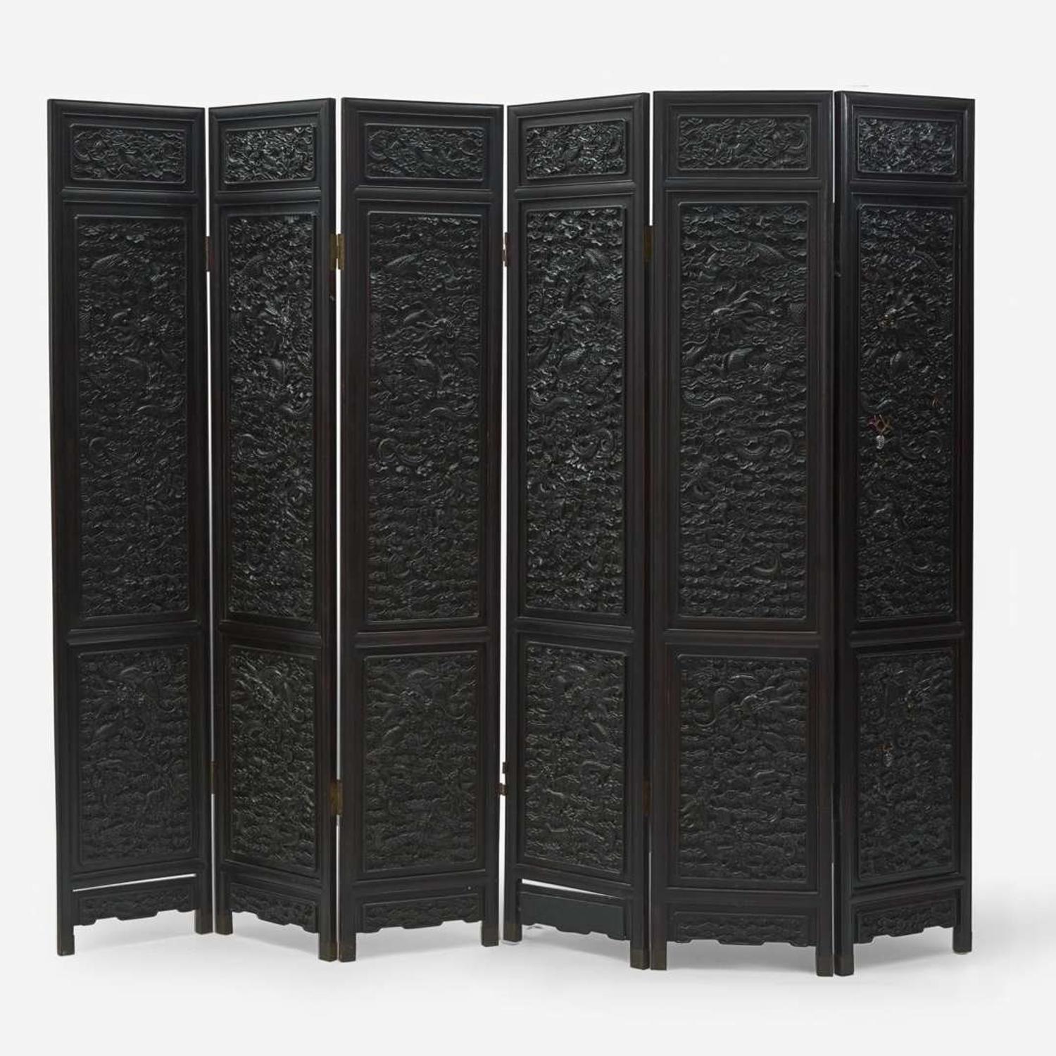 A Chinese carved hardwood six-panel “Dragons” screen 硬木浮雕龙纹六开屏风