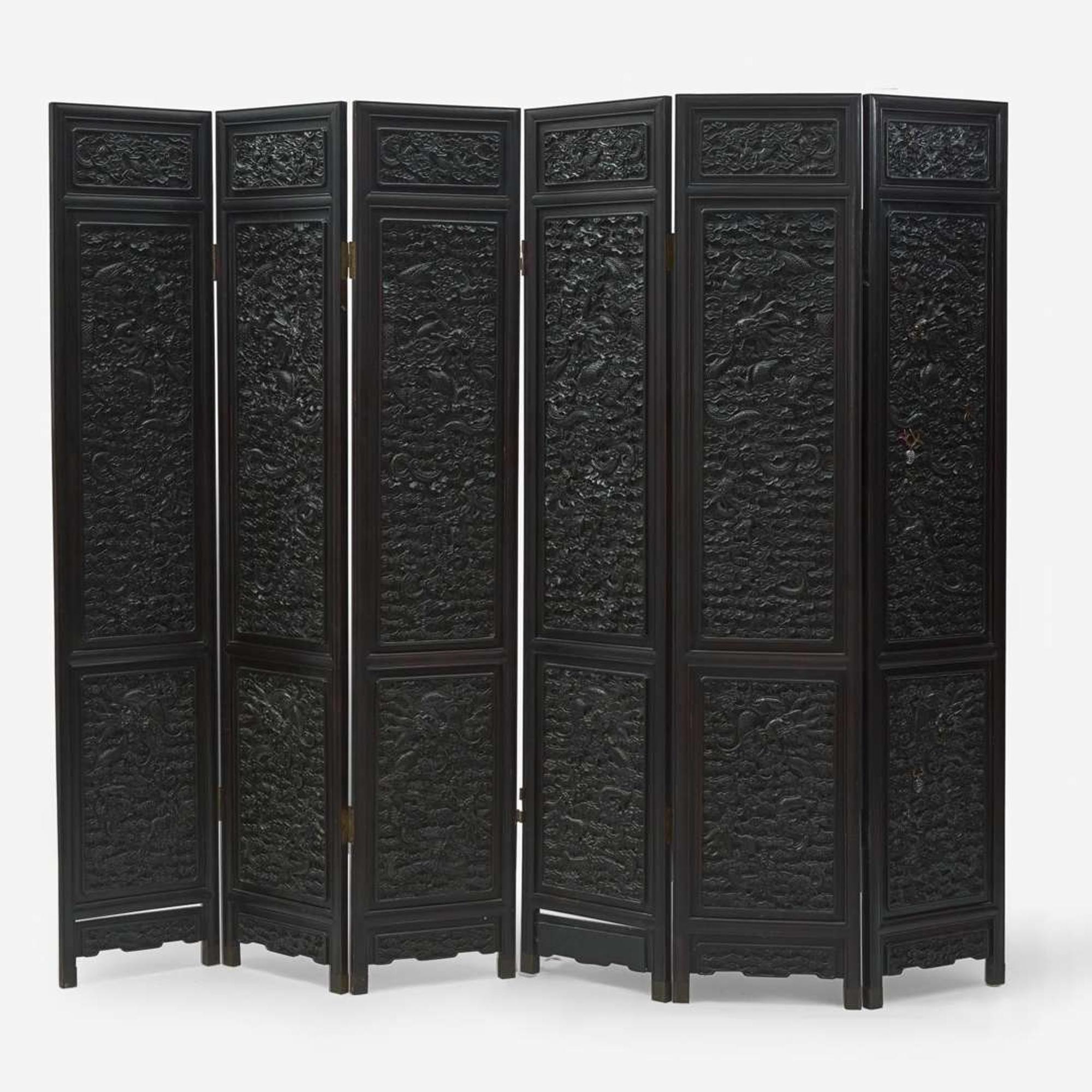 A Chinese carved hardwood six-panel “Dragons” screen 硬木浮雕龙纹六开屏风