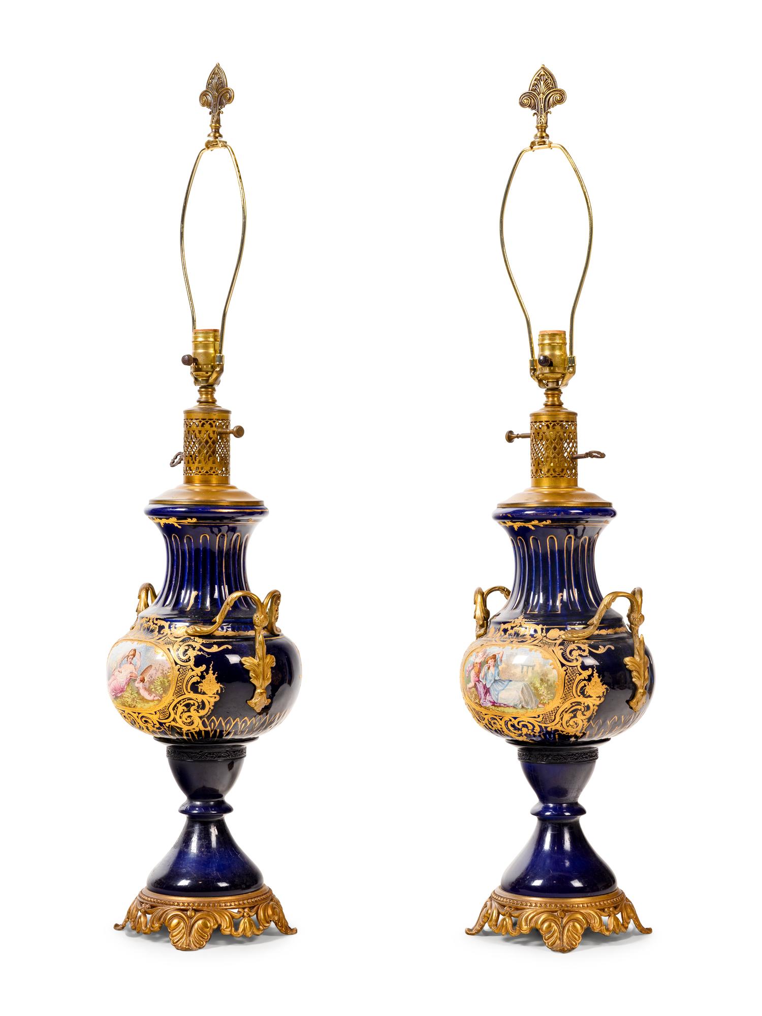 A Pair of Sèvres Style Porcelain Vases Mounted as Lamps
