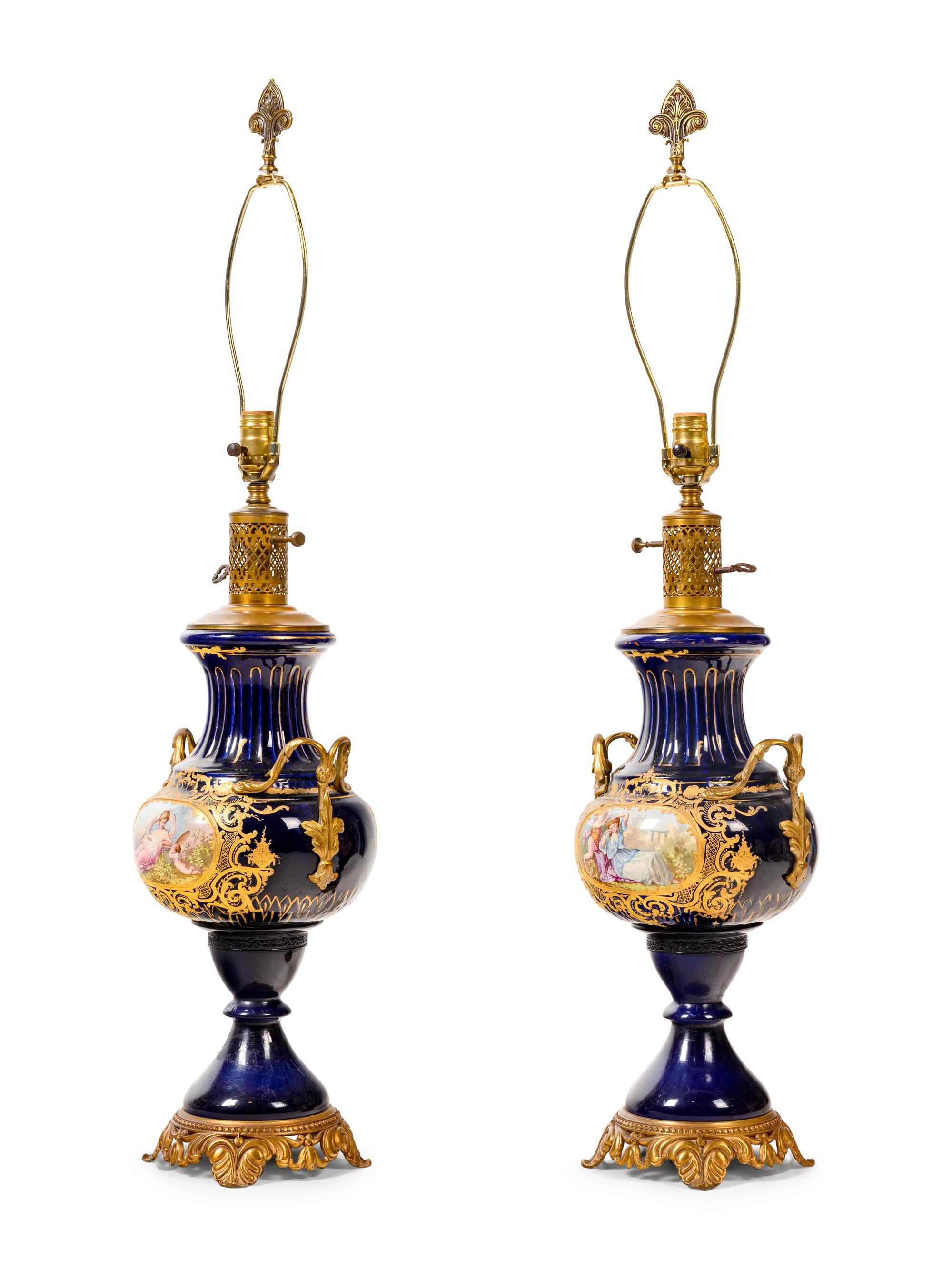A Pair of Sèvres Style Porcelain Vases Mounted as Lamps