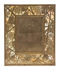 A Tiffany Studios Gilt Bronze Picture Frame 9 1/8 x 7 1/8 inches. — 20TH CENTURY