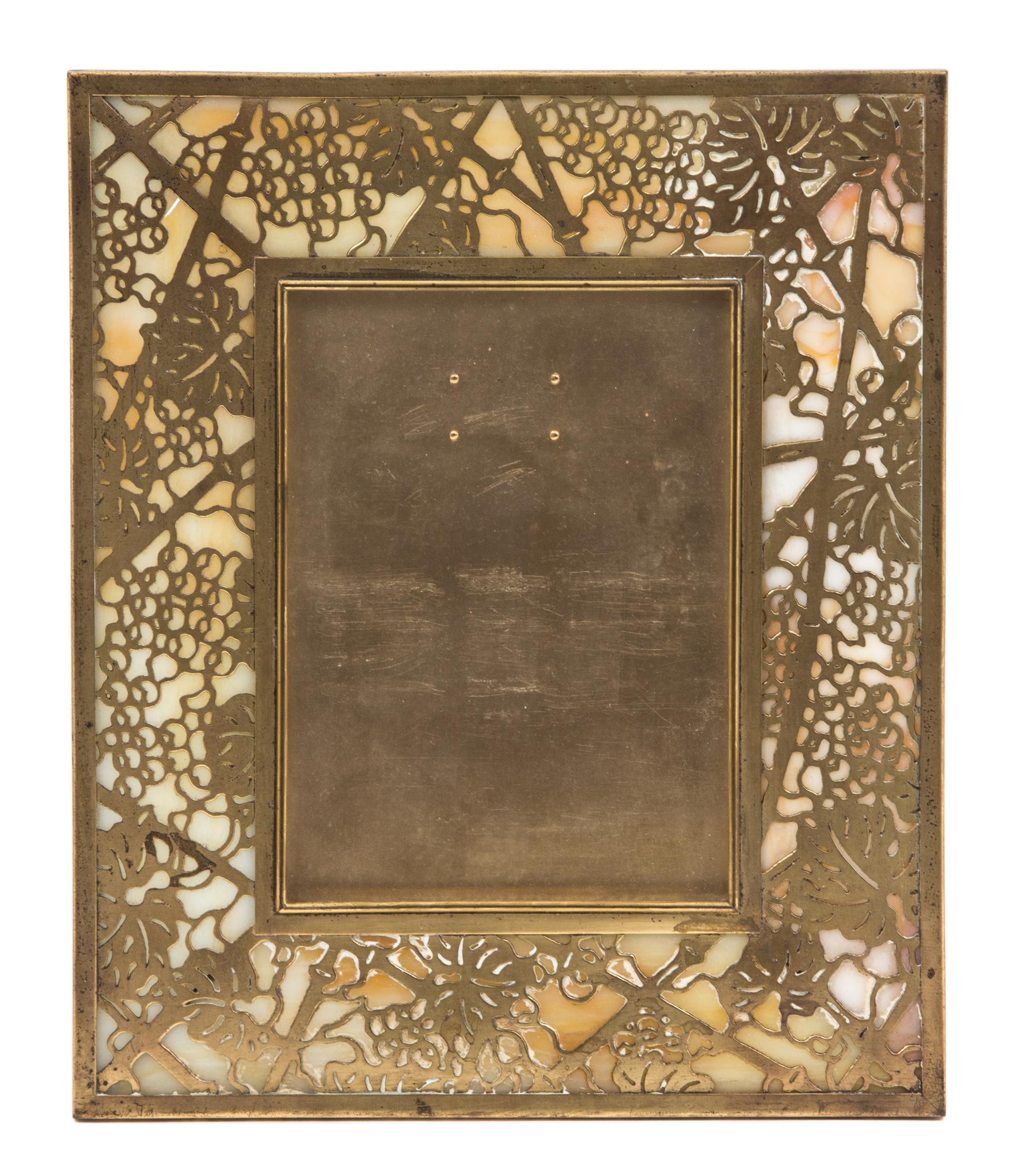A Tiffany Studios Gilt Bronze Picture Frame 9 1/8 x 7 1/8 inches. — 20TH CENTURY