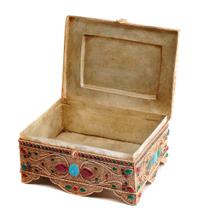 A Silver Filigree and Semi-Precious Stone-Inset Box, 20th Century, of rectangular form with stylized floral decoration.