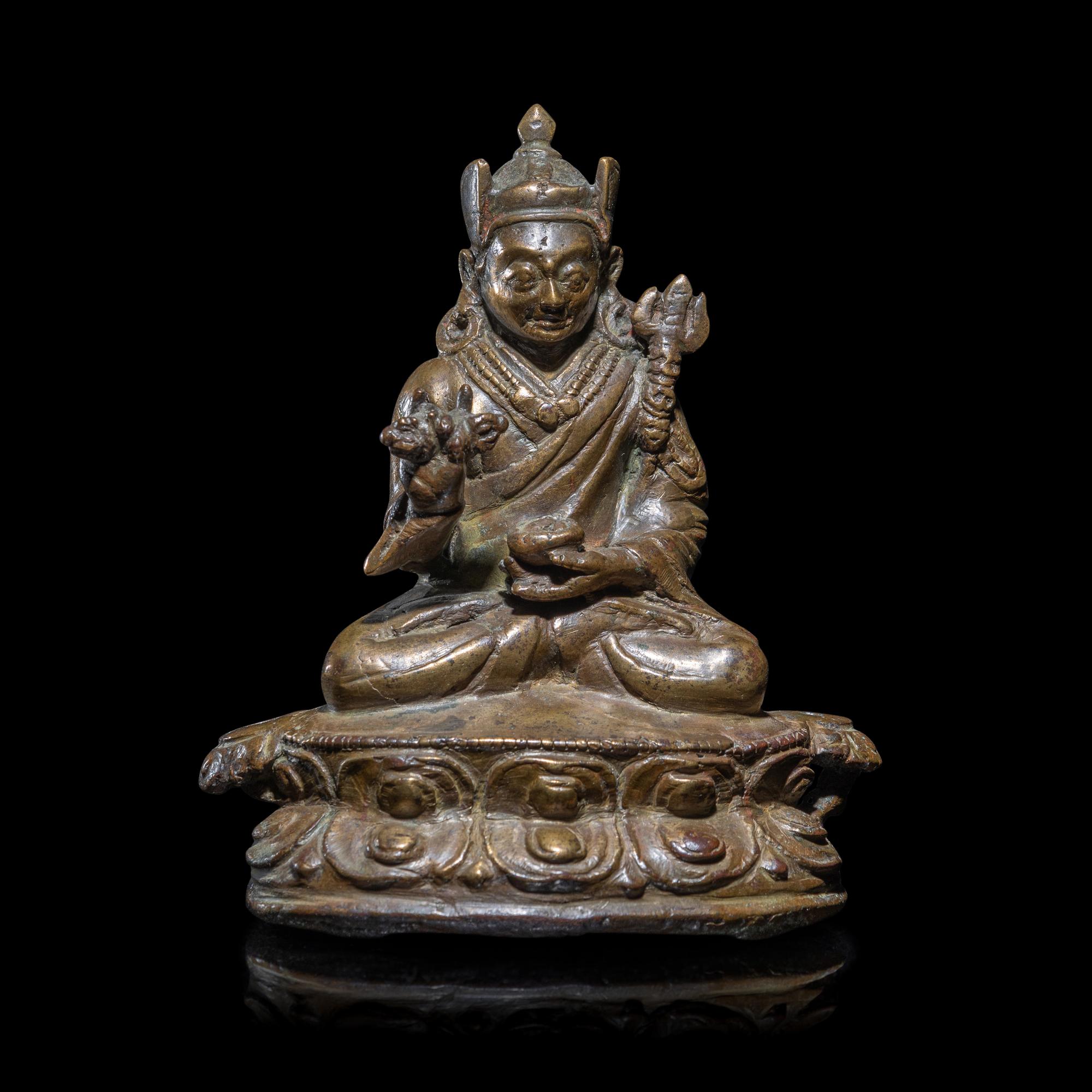 A Tibetan Copper Alloy Seated Figure of Padmasambhava, 16th/17th Century 十六/十七世紀 西藏銅合金銅蓮花生坐像