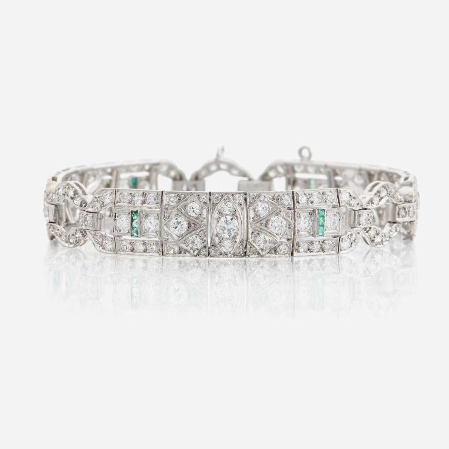 An Art Deco diamond, emerald, and platinum bracelet