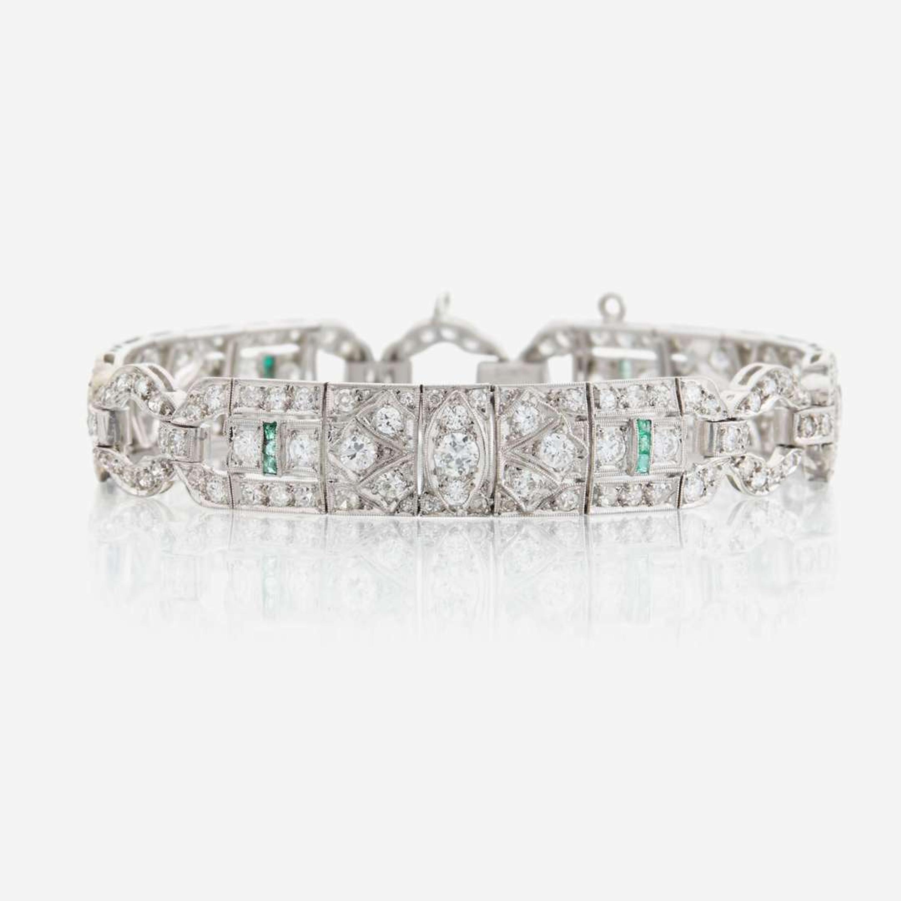 An Art Deco diamond, emerald, and platinum bracelet