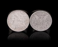 A Group of Sixteen United States 1884-O Morgan Silver Dollar Coins