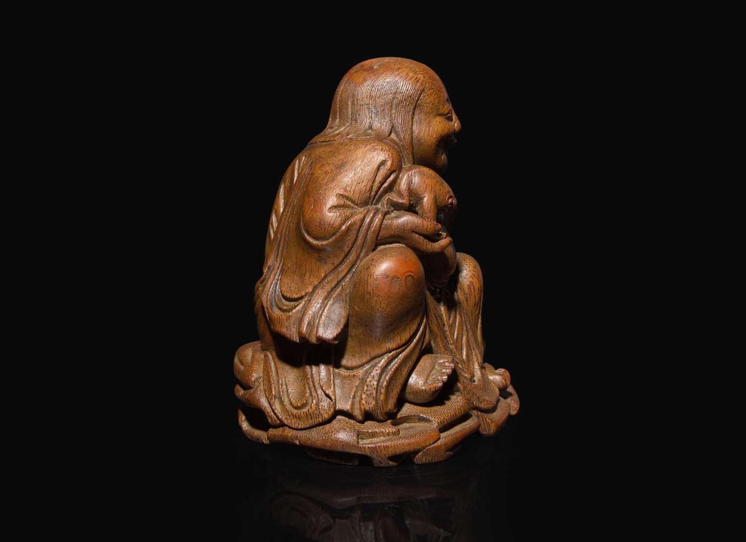A Chinese carved bamboo figure of the immortal Liu Hai, Qing dynasty, 19th century or earlier 竹雕劉海 清 十九世紀或更早