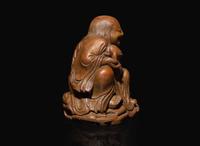 A Chinese carved bamboo figure of the immortal Liu Hai, Qing dynasty, 19th century or earlier 竹雕劉海 清 十九世紀或更早