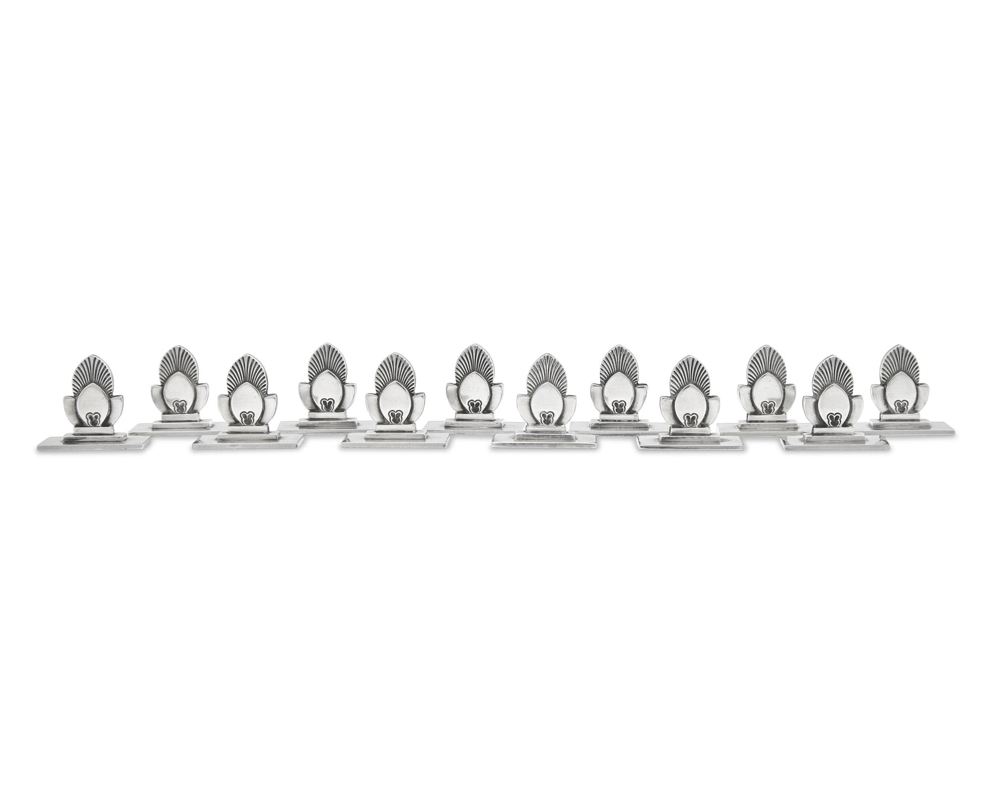 A Set of Twelve Gundorph Albertus Georg Jensen Silver Cactus Pattern Place Card Holders
