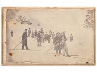 [EARLY PHOTOGRAPHY]. Rare CDV providing an early view of longboard skiers on a mountainside.