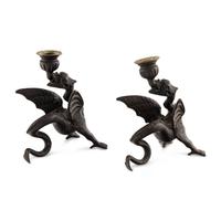 A Pair of Cast Metal Griffin Candlesticks