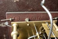 A Federal Carved and Inlaid, Brass-Mounted Mahogany Tall Case Clock