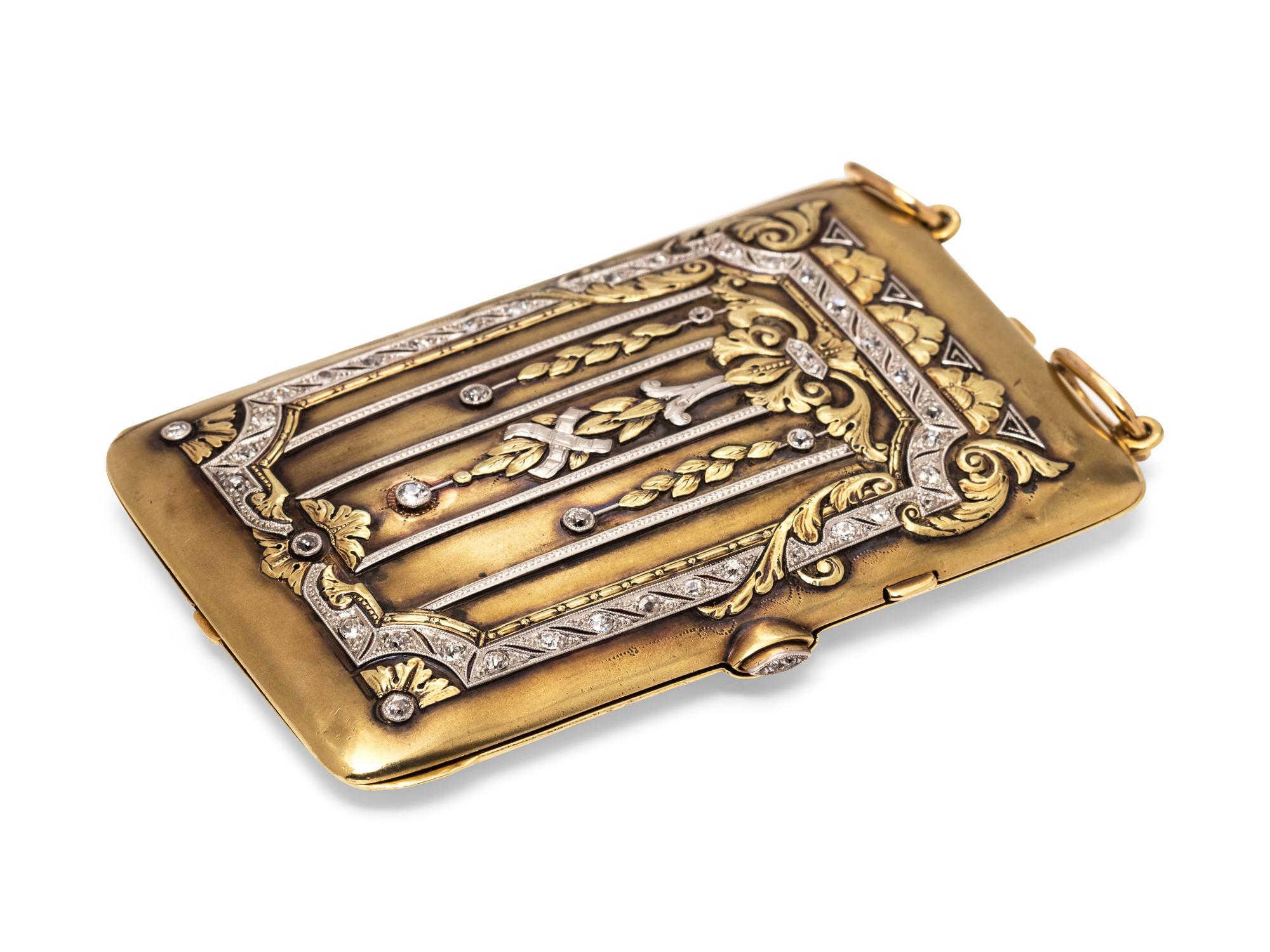 An Edwardian Platinum Topped Yellow Gold and Diamond Necessaire Pendant,