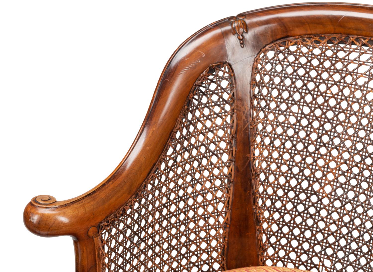 A Pair of English Walnut Barrel-Back Armchairs