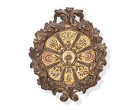 An Italian ecclesiastical embroidered silk roundel depicting a Saint, 18th century