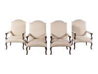 A Set of Four Régence Style Carved Walnut Library Chairs