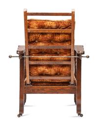 A Victorian Carved Mahogany and Tufted Velvet Upholstered Child's Reclining Armchair