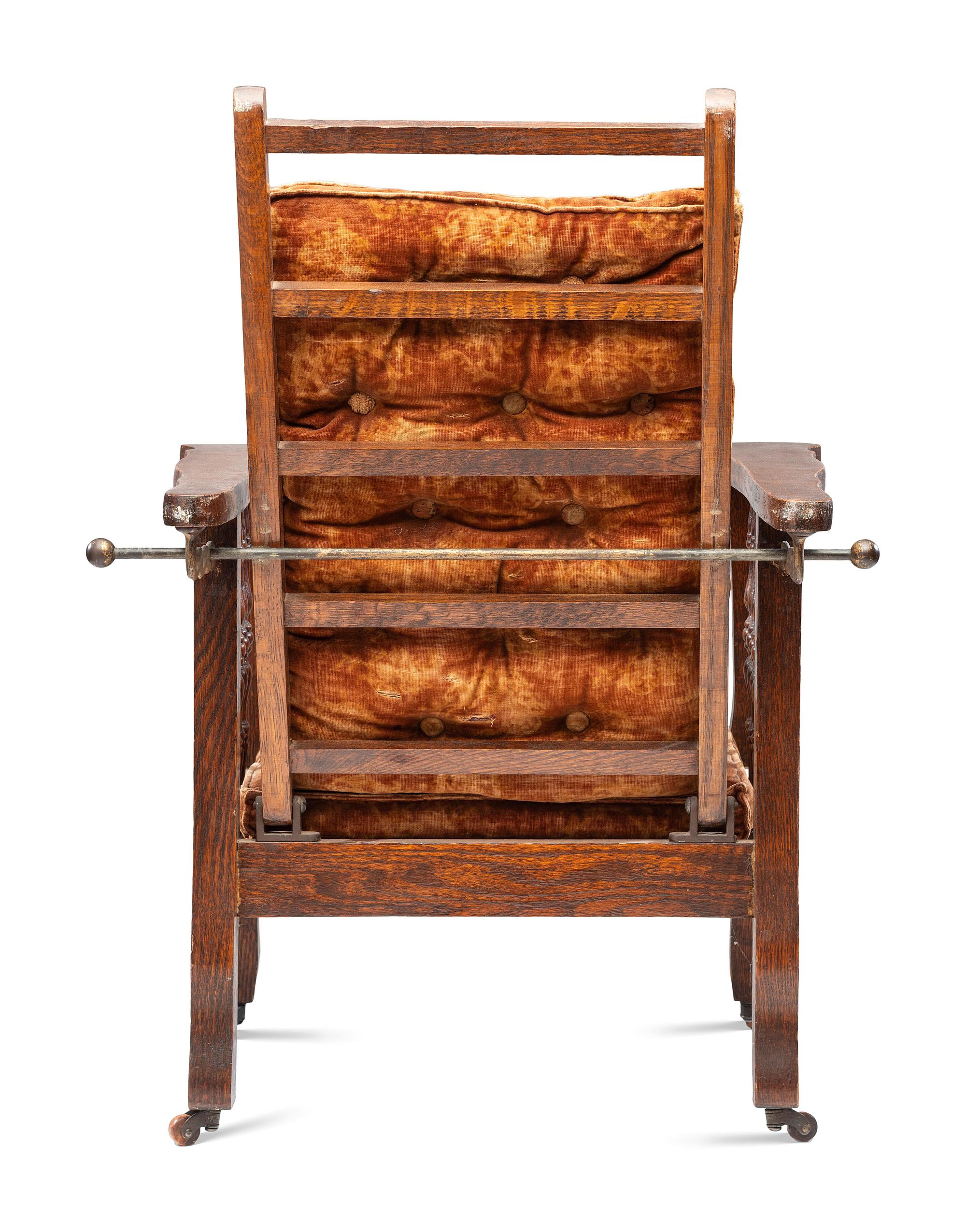A Victorian Carved Mahogany and Tufted Velvet Upholstered Child's Reclining Armchair