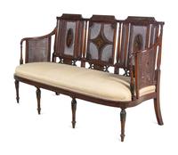 An Edwardian Painted Satinwood Caned Settee