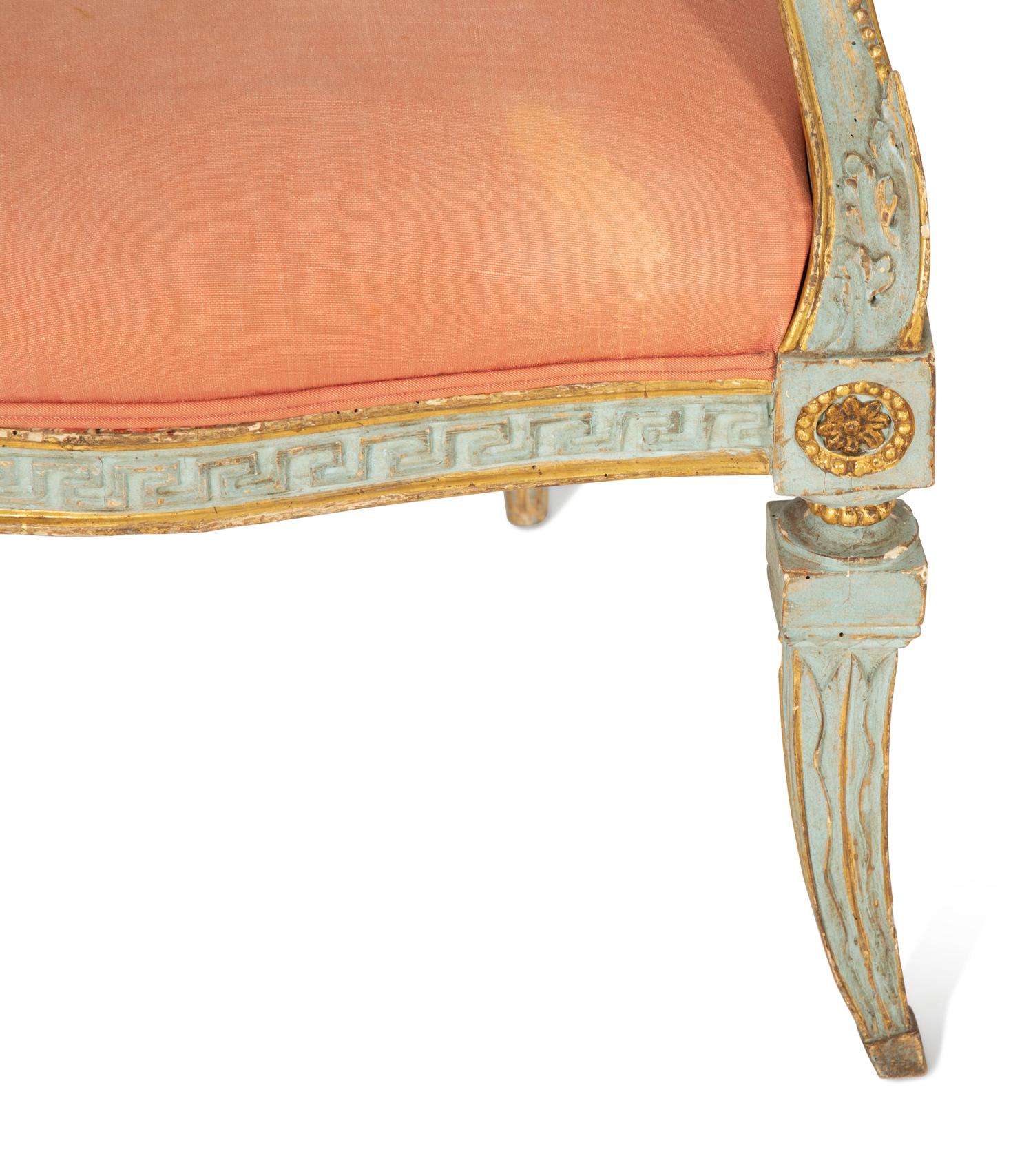 A Pair of Venetian Painted and Parcel Gilt Armchairs