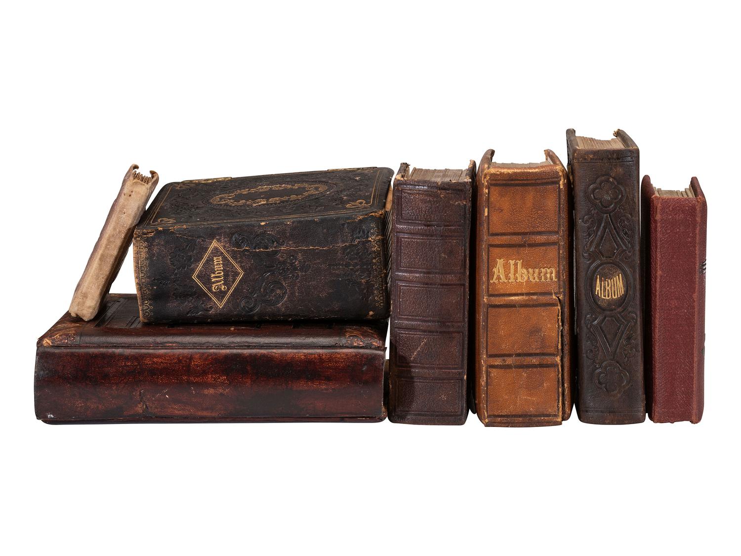 [EARLY PHOTOGRAPHY]. A group of 10 albums containing over 300 cabinet cards, CDVs, and tintypes.