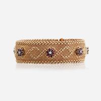 A gold, diamond, and ruby bracelet