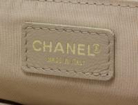 A Chanel Cream Caviar Leather Quilted Backpack, 12"x 10" x 3".